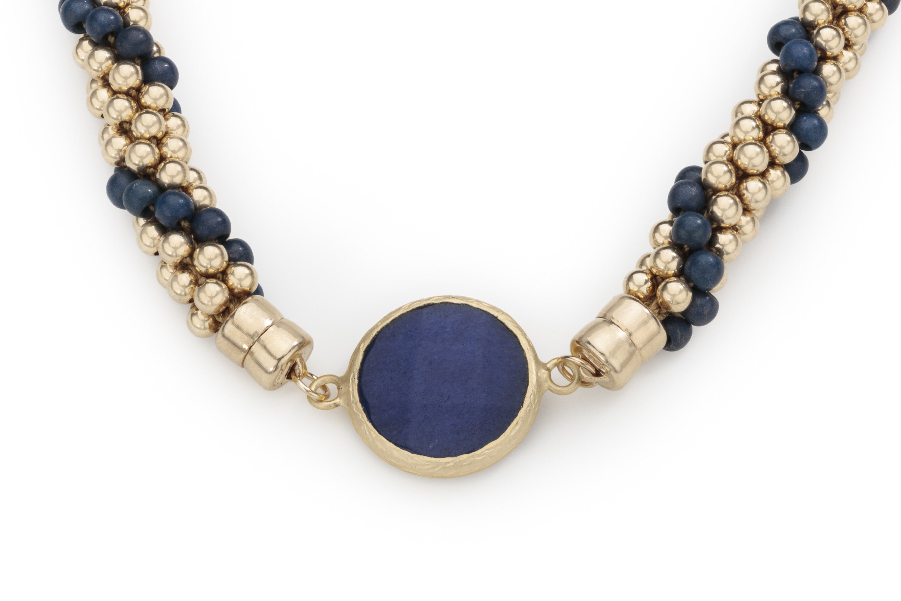 Circular dark blue dyed jade